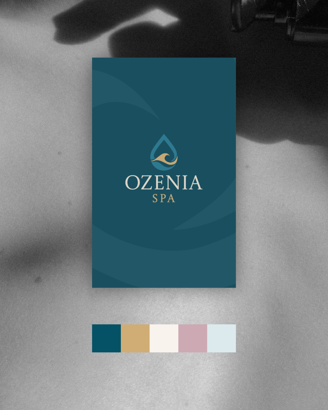 Ozenia Spa logo and colour palette on a teal brand card